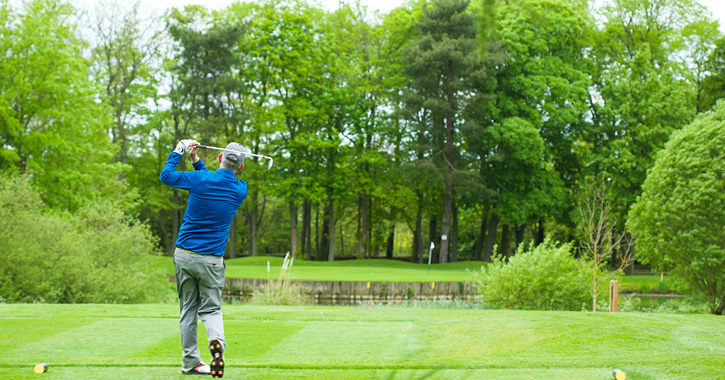 man playing golf at Headlam Hall Hotel